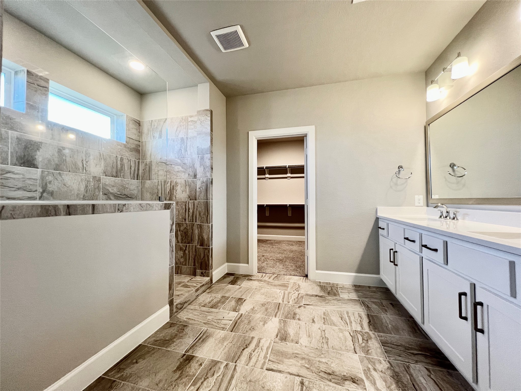 547 Kingston Lane Conroe, TX 77384 - Photo 26 of 50 a bathroom with a sink a toilet and shower