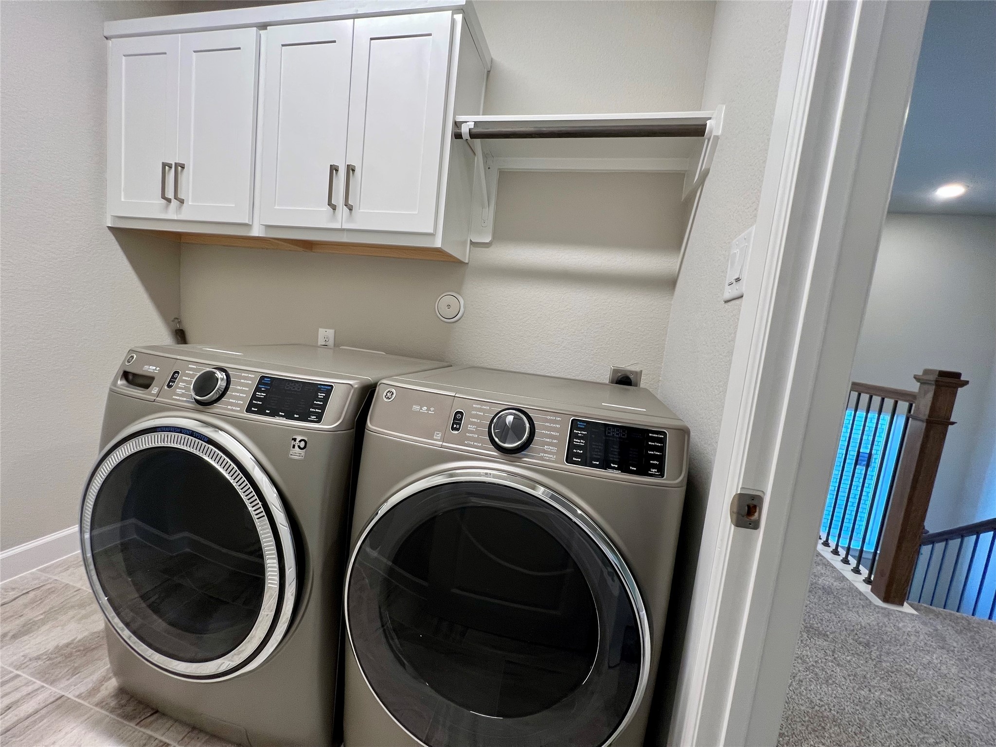547 Kingston Lane Conroe, TX 77384 - Photo 38 of 50 a view of storage and utility room with washer and dryer