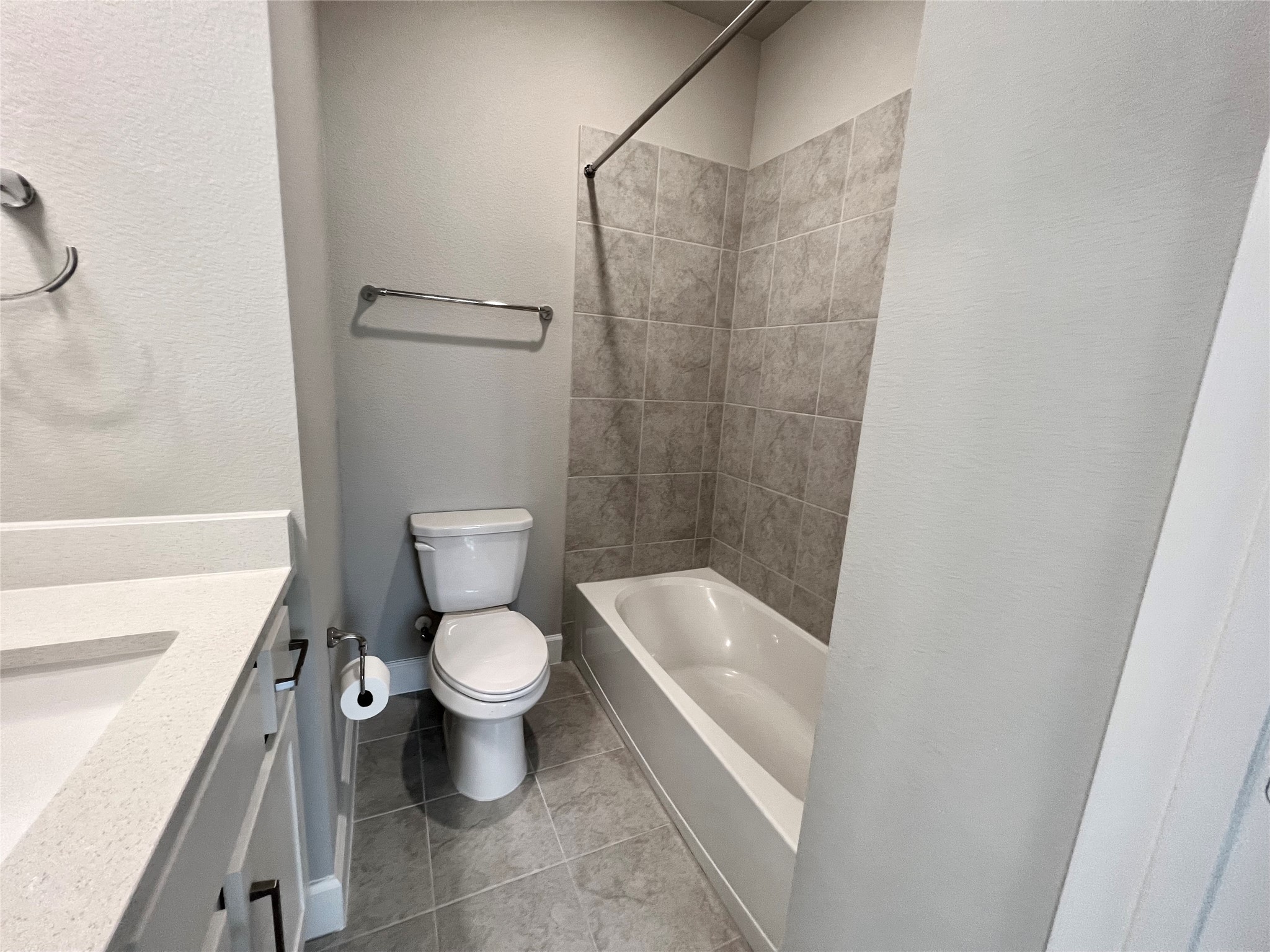 547 Kingston Lane Conroe, TX 77384 - Photo 47 of 50 a white toilet sitting next to a bath tub