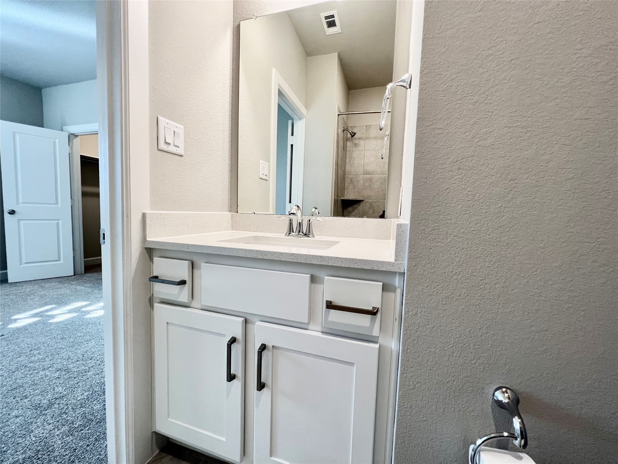 547 Kingston Lane Conroe, TX 77384 - Photo 48 of 50 a bathroom with a sink and a mirror