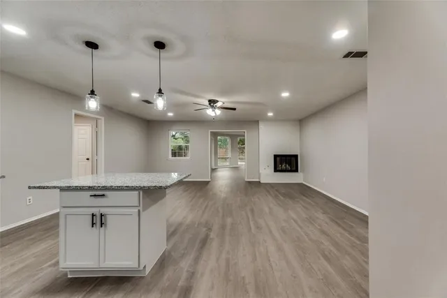 a view of an empty room and window