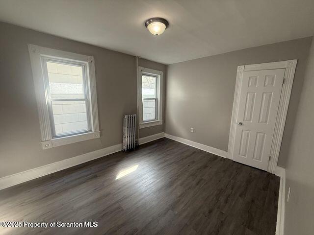 508 Harrison Avenue Scranton, PA 18510 - Photo 8 of 10 a view of an empty room with wooden floor and a window