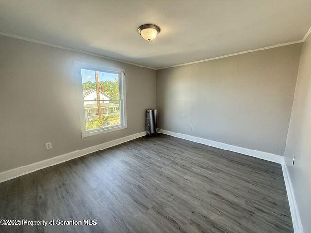 508 Harrison Avenue Scranton, PA 18510 - Photo 9 of 10 an empty room with wooden floor and windows