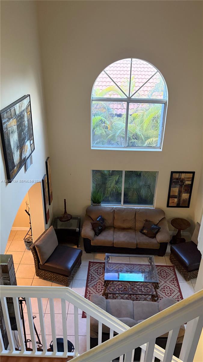13553 Southwest 124th Avenue Road Miami, FL 33186 - Photo 25 of 31 a living room with furniture and a window
