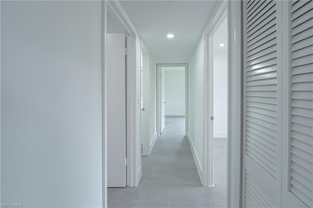 7233 Coolidge Road Fort Myers, FL 33967 - Photo 15 of 36 a view of a hallway with closet