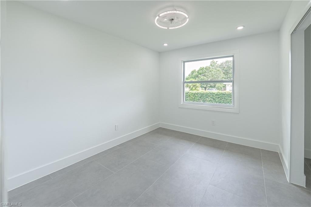 7233 Coolidge Road Fort Myers, FL 33967 - Photo 16 of 36 an empty room with a window