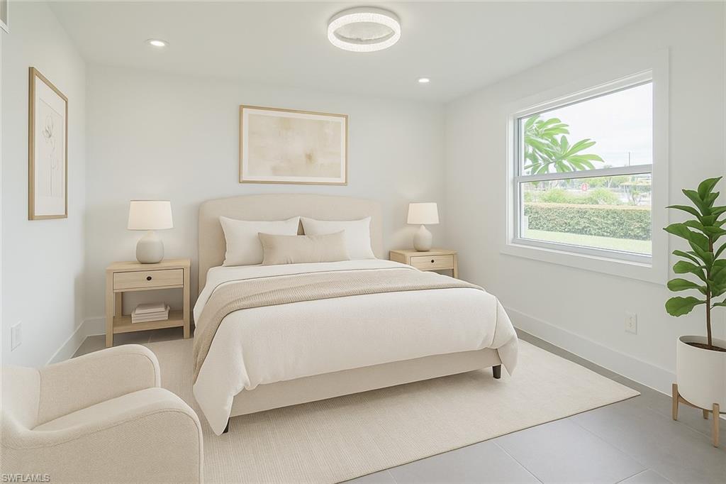 7233 Coolidge Road Fort Myers, FL 33967 - Photo 18 of 36 a bedroom with a bed and a painting on the wall