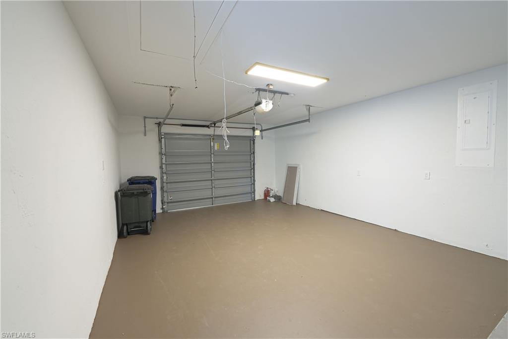 7233 Coolidge Road Fort Myers, FL 33967 - Photo 25 of 36 a view of a garage