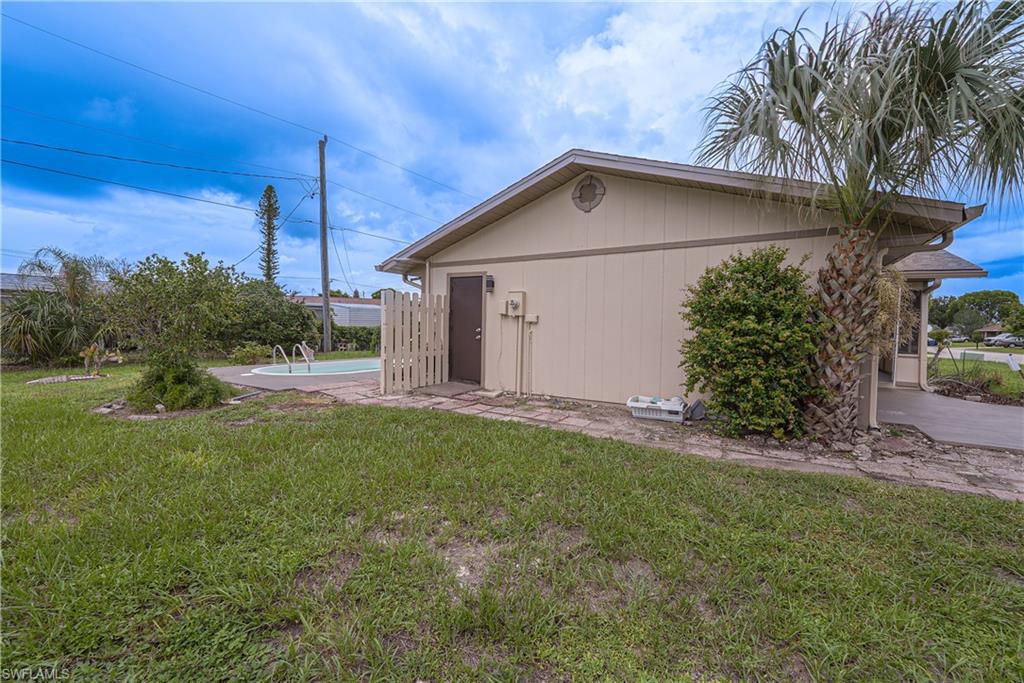 7233 Coolidge Road Fort Myers, FL 33967 - Photo 27 of 36 a house view with a garden space