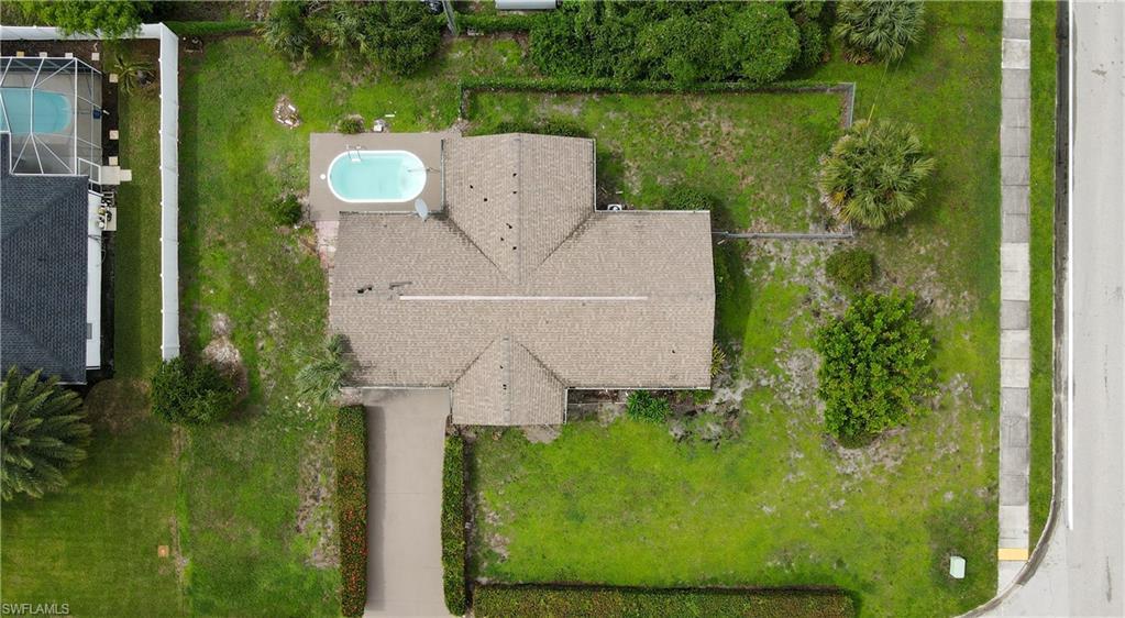 7233 Coolidge Road Fort Myers, FL 33967 - Photo 31 of 36 an aerial view of a house with a yard basket ball court and outdoor seating
