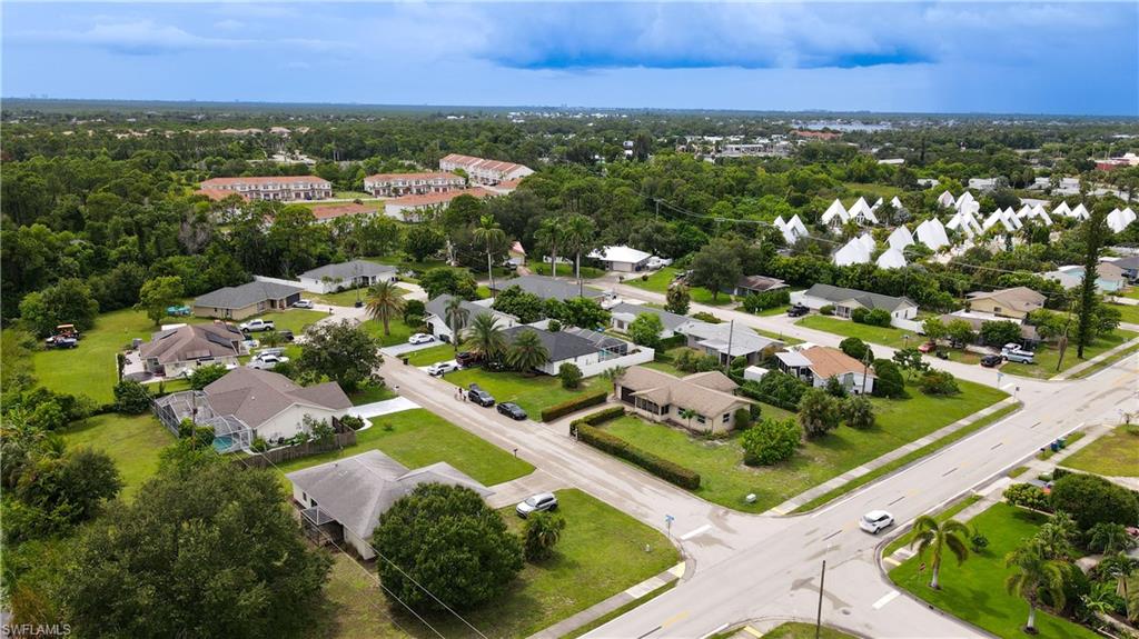 7233 Coolidge Road Fort Myers, FL 33967 - Photo 32 of 36 an aerial view of residential houses with outdoor space and river