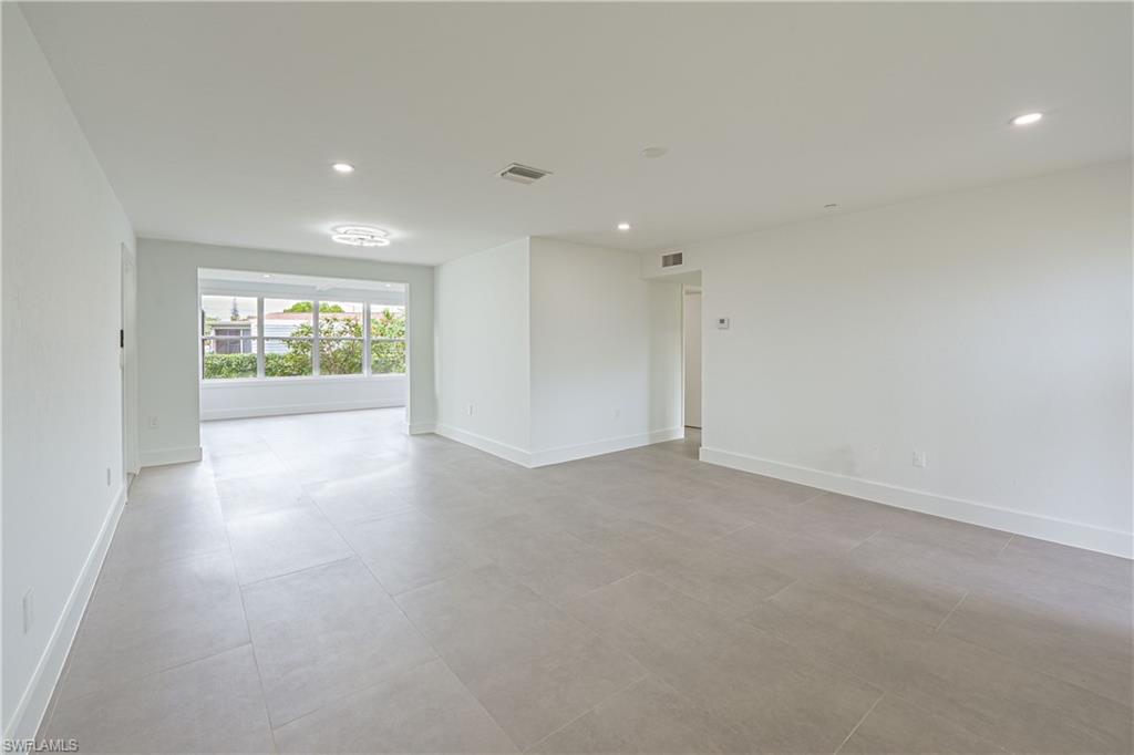 7233 Coolidge Road Fort Myers, FL 33967 - Photo 10 of 36 an empty room with windows