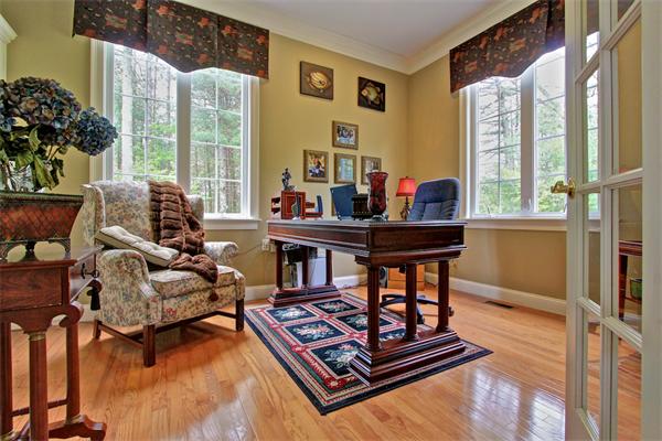 9 Riverbend Road Upton, MA 01568 - Photo 13 of 30 a living room with furniture and a floor to ceiling window