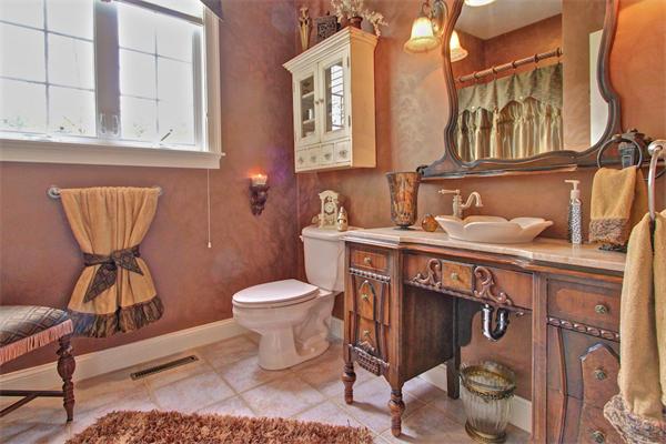 9 Riverbend Road Upton, MA 01568 - Photo 15 of 30 a bathroom with a toilet a sink and a mirror