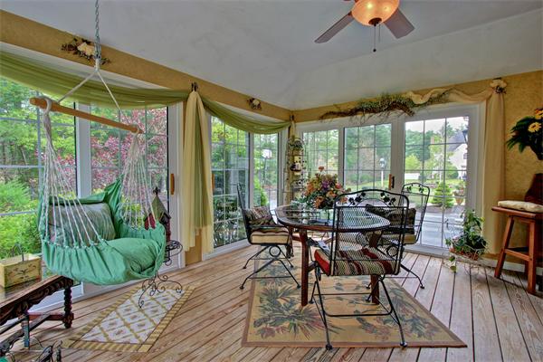 9 Riverbend Road Upton, MA 01568 - Photo 21 of 30 a balcony with furniture and a potted plant