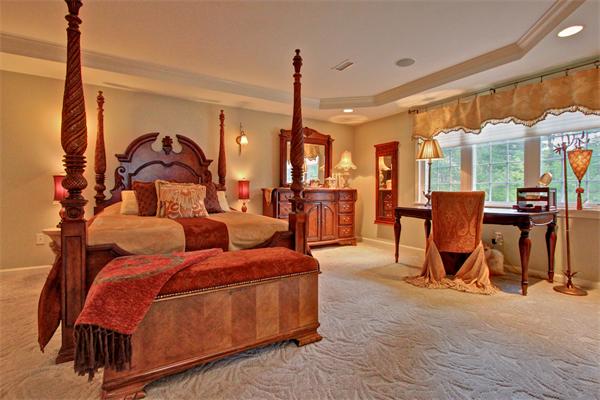 9 Riverbend Road Upton, MA 01568 - Photo 22 of 30 a bedroom with furniture and a floor to ceiling window