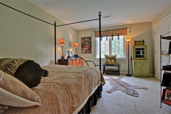 9 Riverbend Road Upton, MA 01568 - Photo 26 of 30 a bed room with a bed window and a chair