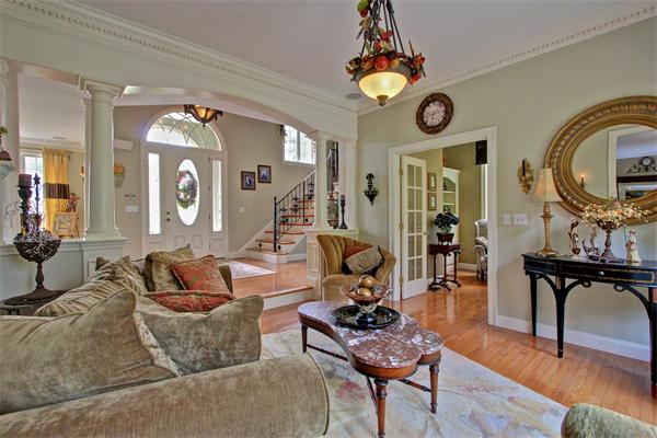 9 Riverbend Road Upton, MA 01568 - Photo 9 of 30 a living room with furniture and a mirror
