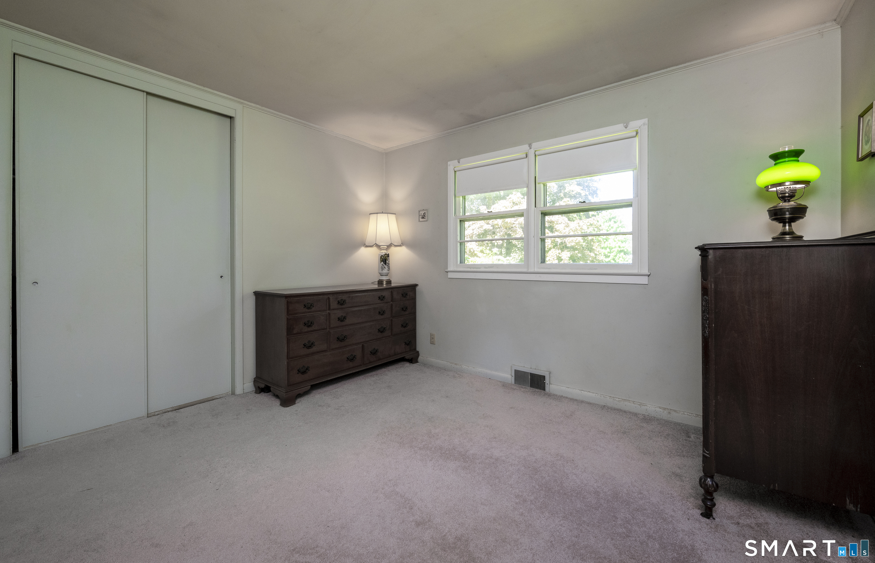 39 Indian Mountain Road Salisbury, CT 06039 - Photo 15 of 16 an empty room with windows and closet