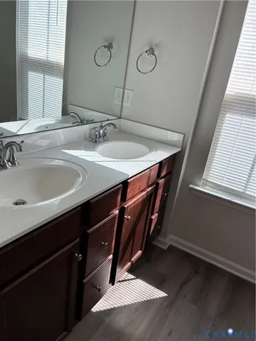 a bathroom with a glass door shower