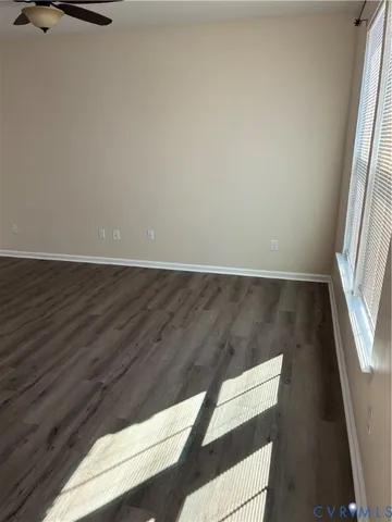a view of a livingroom with wooden floor