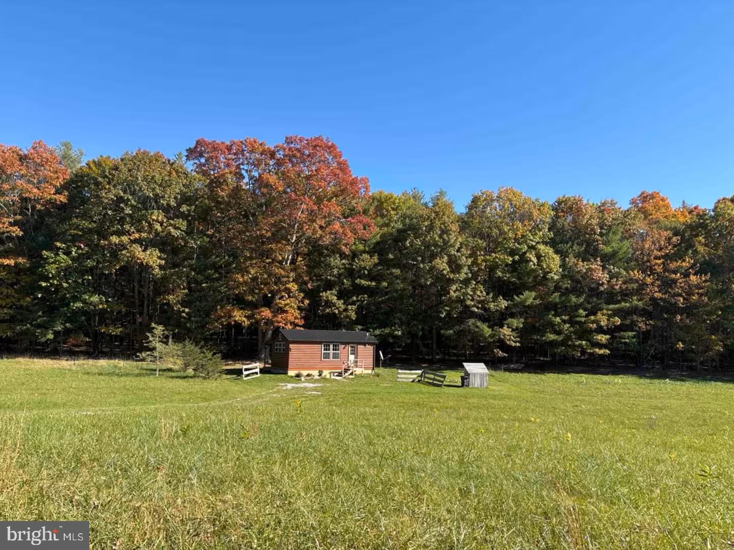 184 Skiles- Pitsenbarger Road Franklin, WV 26807 - Photo 26 of 39 Charming cabin amid autumn hues.