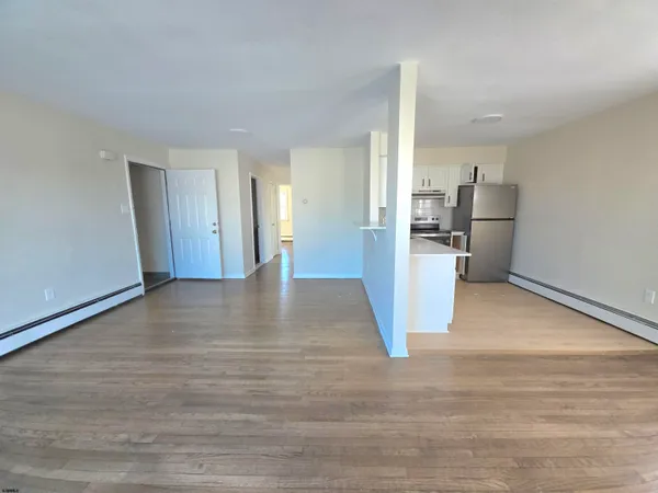 a view of a kitchen with a sink