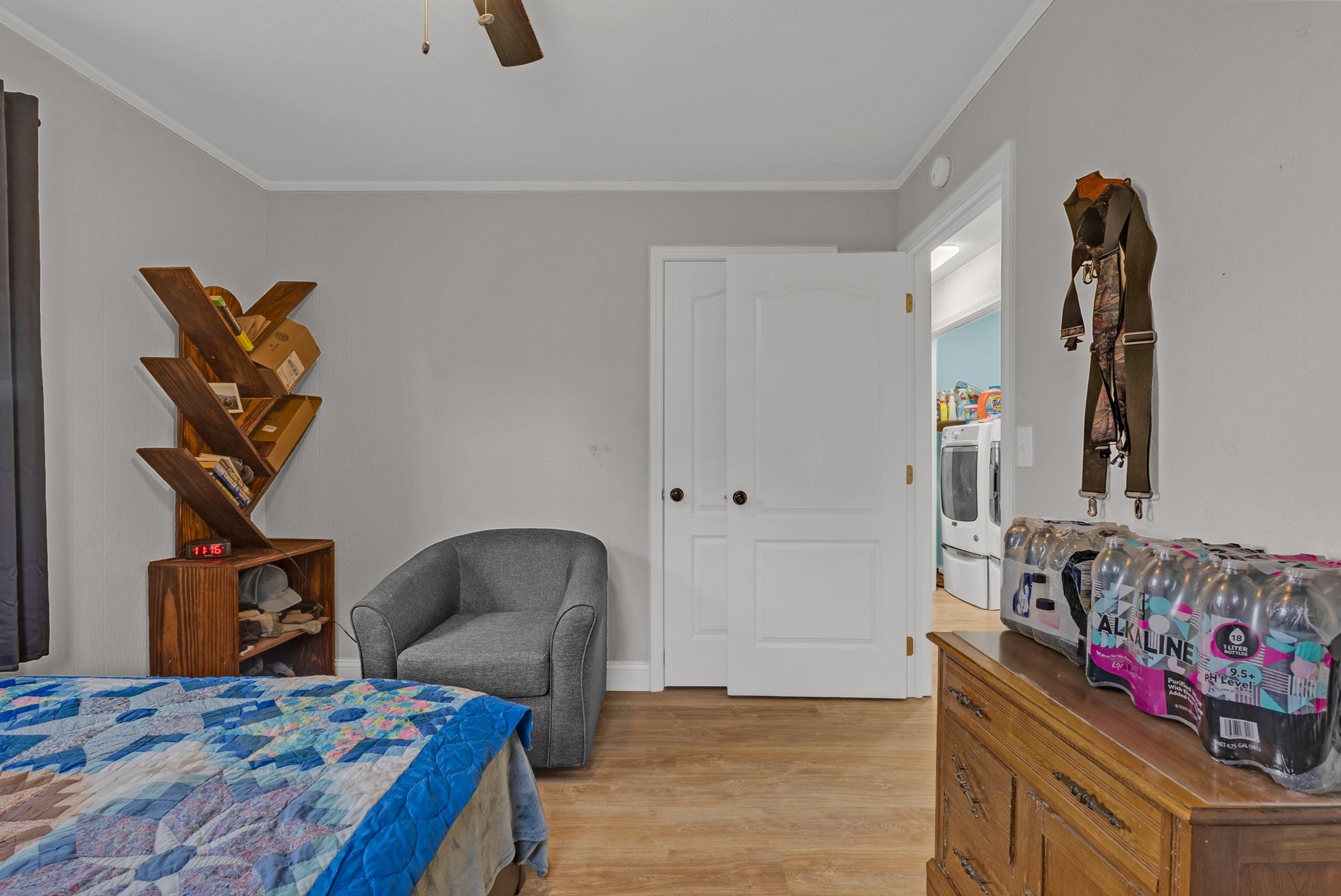 921 Barney Holt Road Jamestown, TN 38556 - Photo 16 of 24 a bedroom with a bed and wooden floor