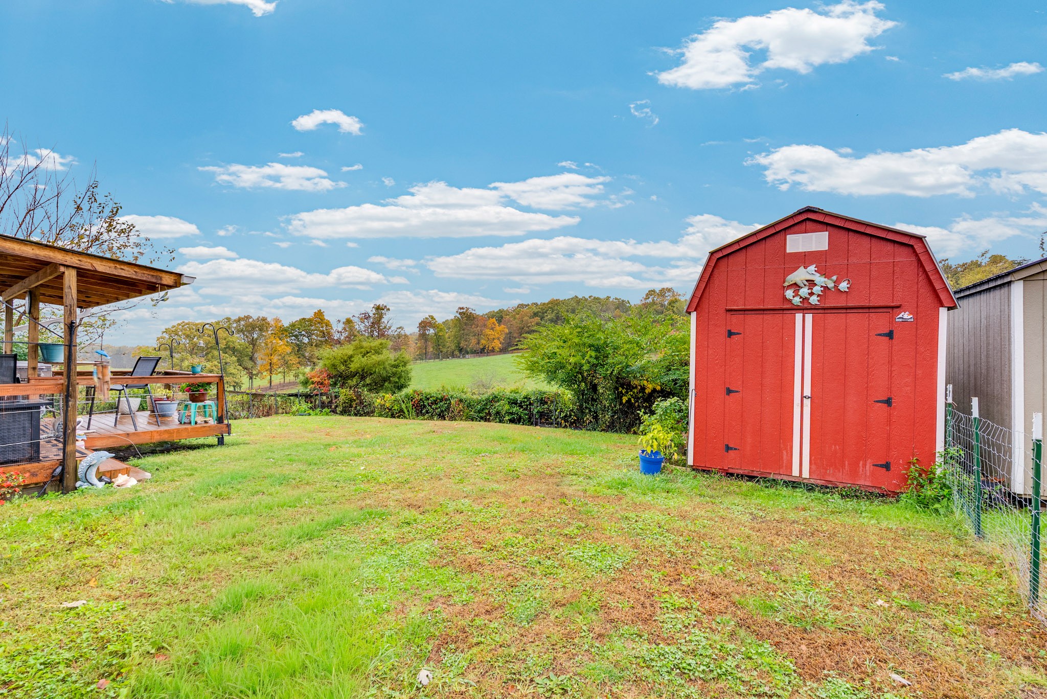921 Barney Holt Road Jamestown, TN 38556 - Photo 19 of 24 a view of a backyard with swimming pool