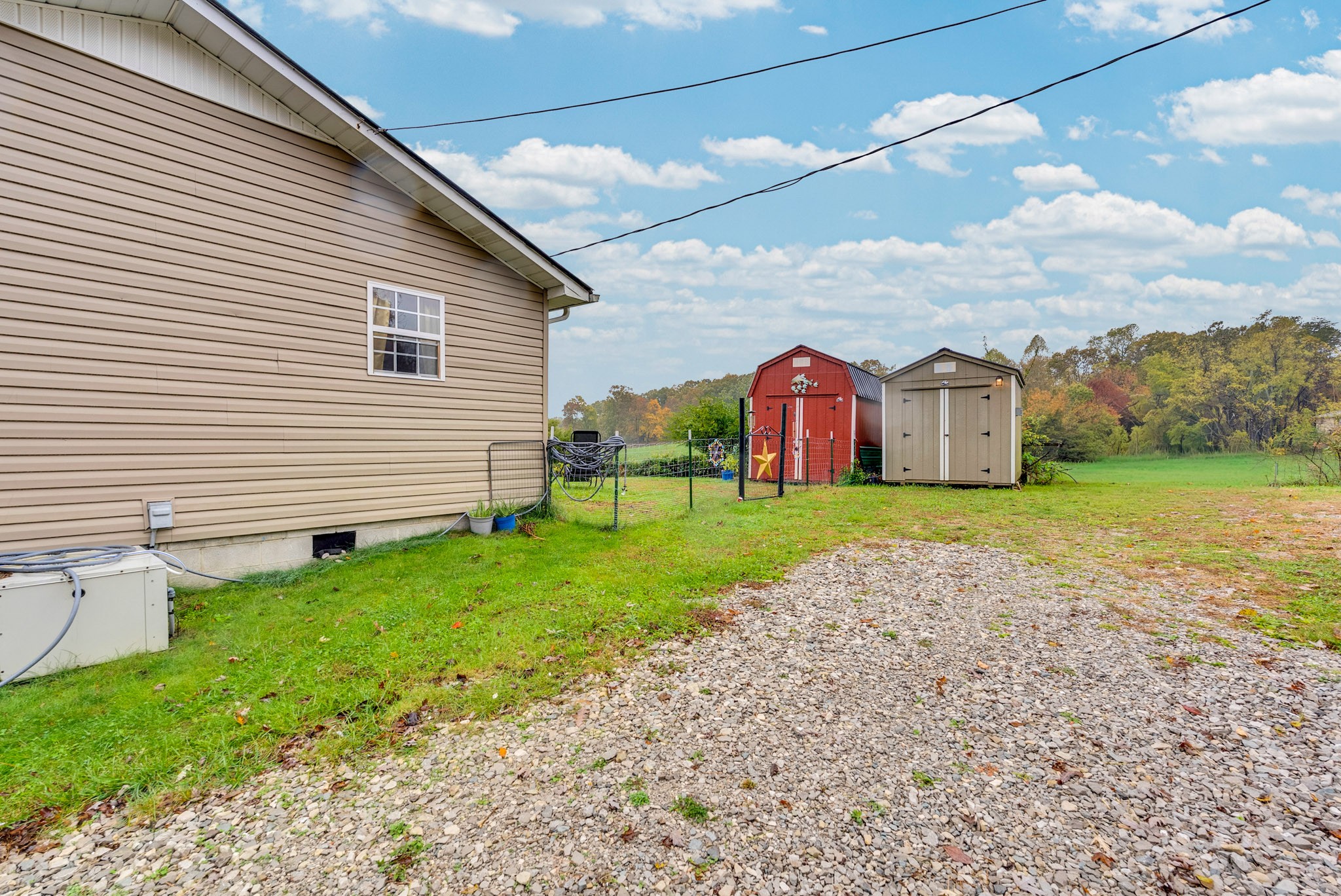 921 Barney Holt Road Jamestown, TN 38556 - Photo 23 of 24 a view of a house with a backyard