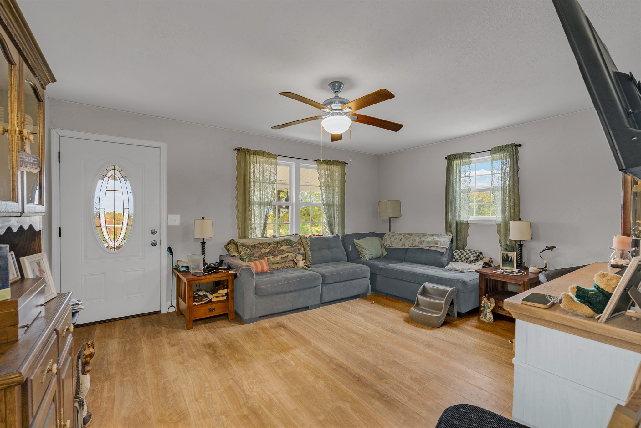 921 Barney Holt Road Jamestown, TN 38556 - Photo 6 of 24 a living room with furniture and a large window