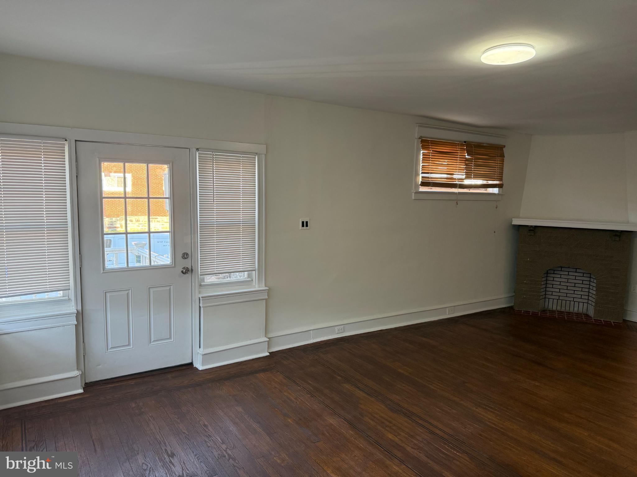 7735 Loretto Avenue Philadelphia, PA 19111 - Photo 6 of 19 an empty room with wooden floor and windows