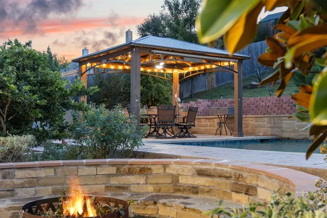 an aerial view of house with yard