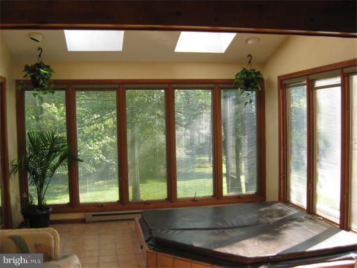 736 Meadowlark Road Audubon, PA 19403 - Photo 3 of 8 Sun Room