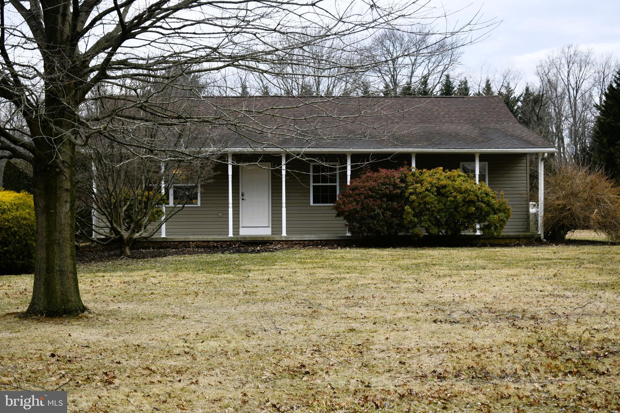 633 Connelly Road Rising Sun, MD 21911 - Photo 1 of 32 front view of a house with a yard