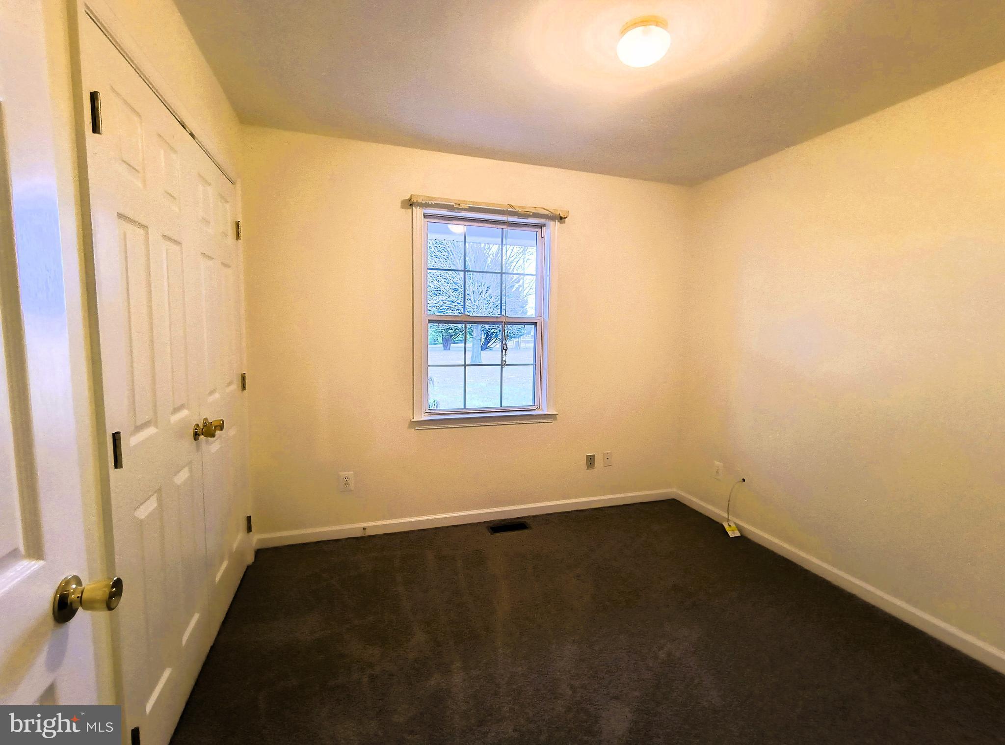 633 Connelly Road Rising Sun, MD 21911 - Photo 8 of 32 an empty room with windows