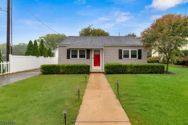 a front view of a house with yard