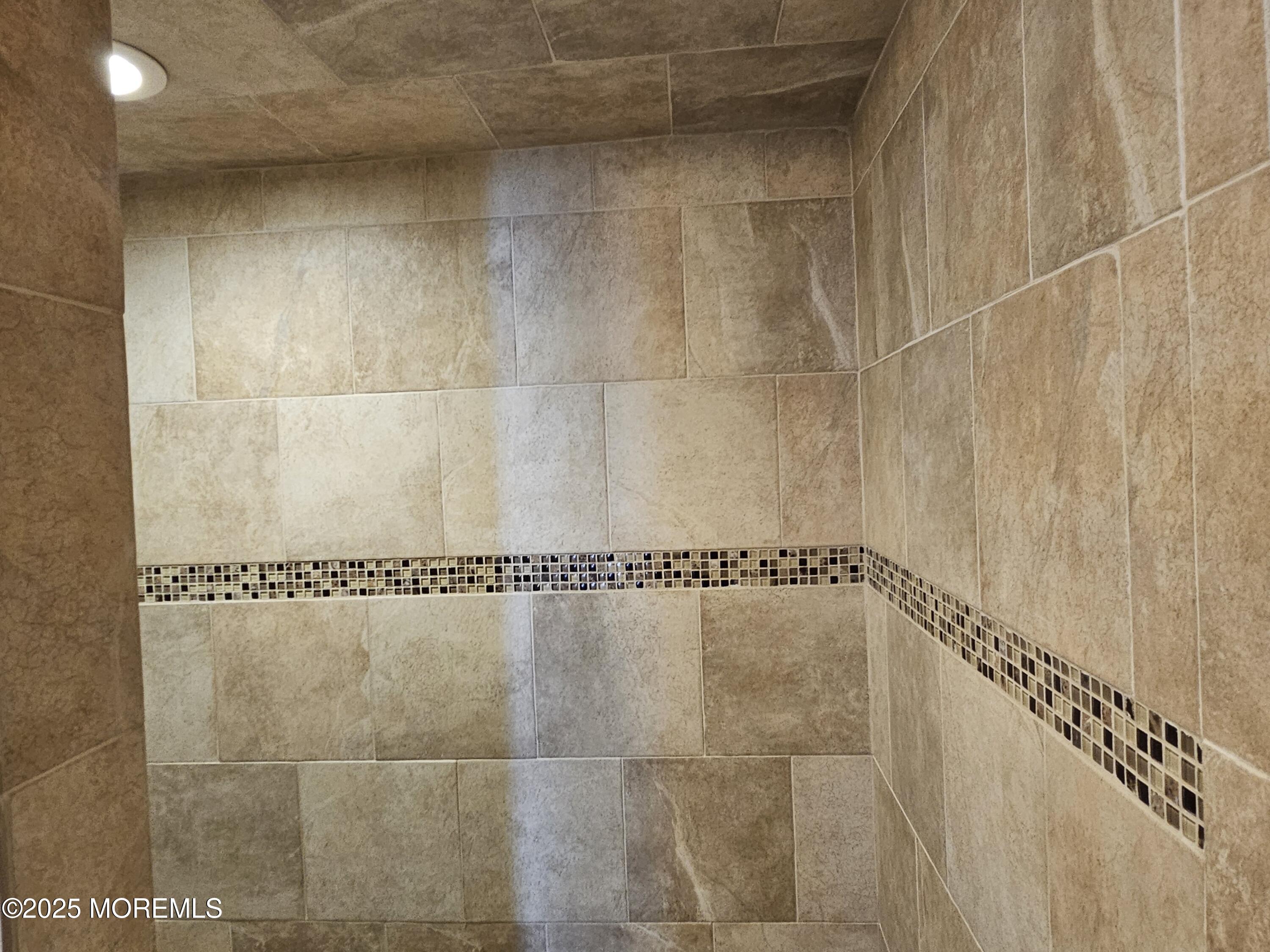 404 Bay Boulevard, Unit 2 Seaside Heights, NJ 08751 - Photo 16 of 16 a bathroom with a shower