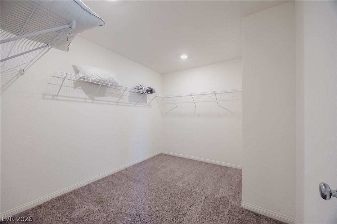 5927 Coja Street Las Vegas, NV 89113 - Photo 21 of 32 Spacious closet featuring carpet floors