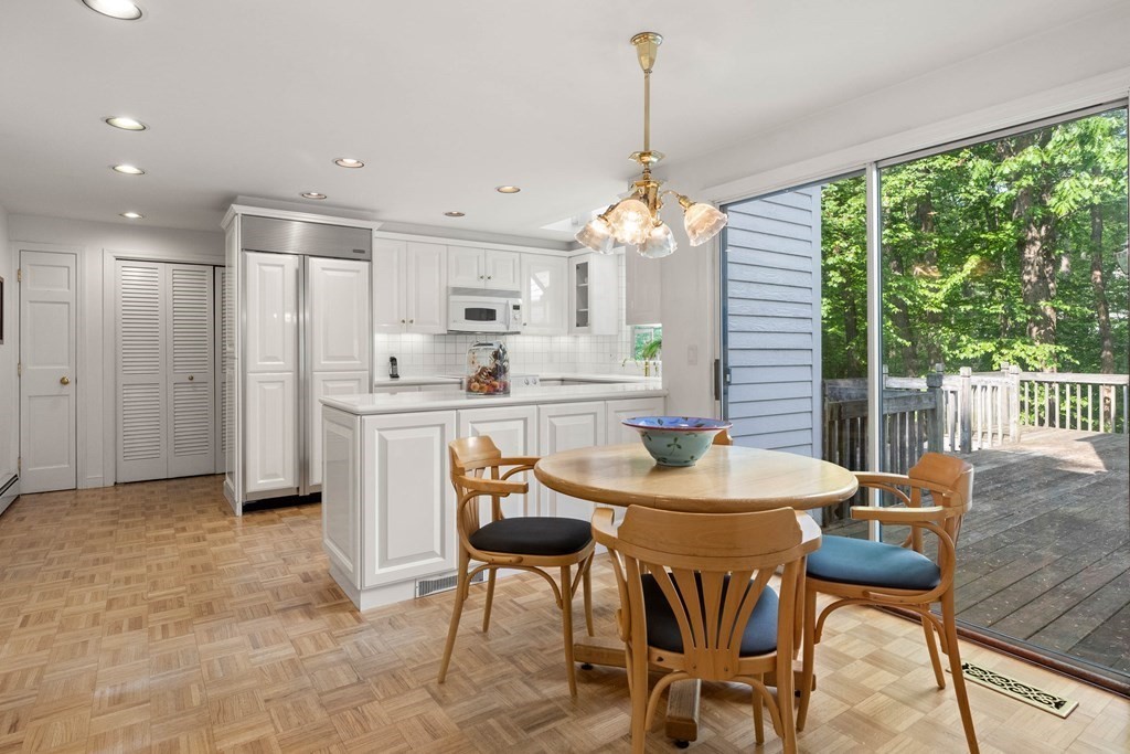 153 Hay Meadow Road North Andover, MA 01845 - Photo 12 of 42 a view of a dining room with furniture window and outside view