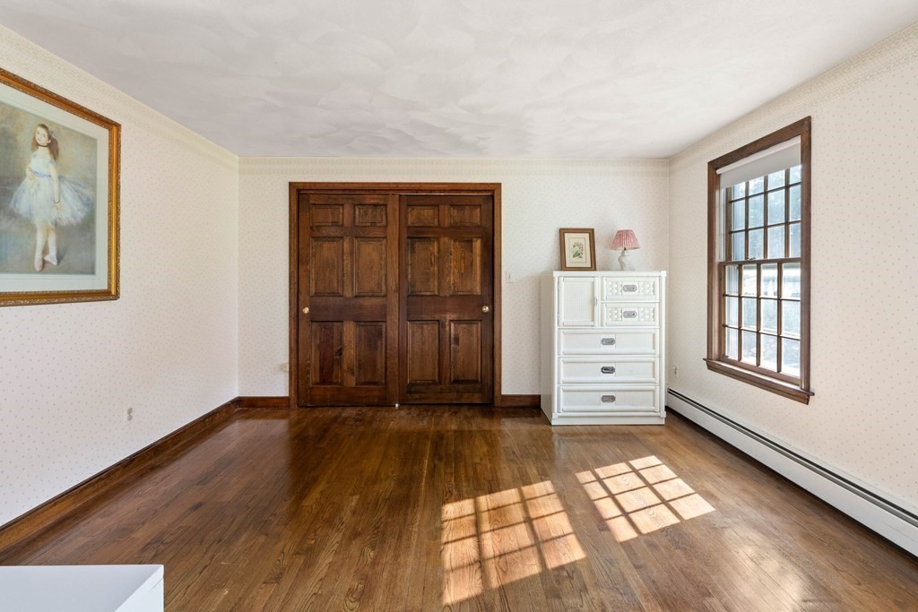 153 Hay Meadow Road North Andover, MA 01845 - Photo 27 of 42 wooden floor in an empty room with a window