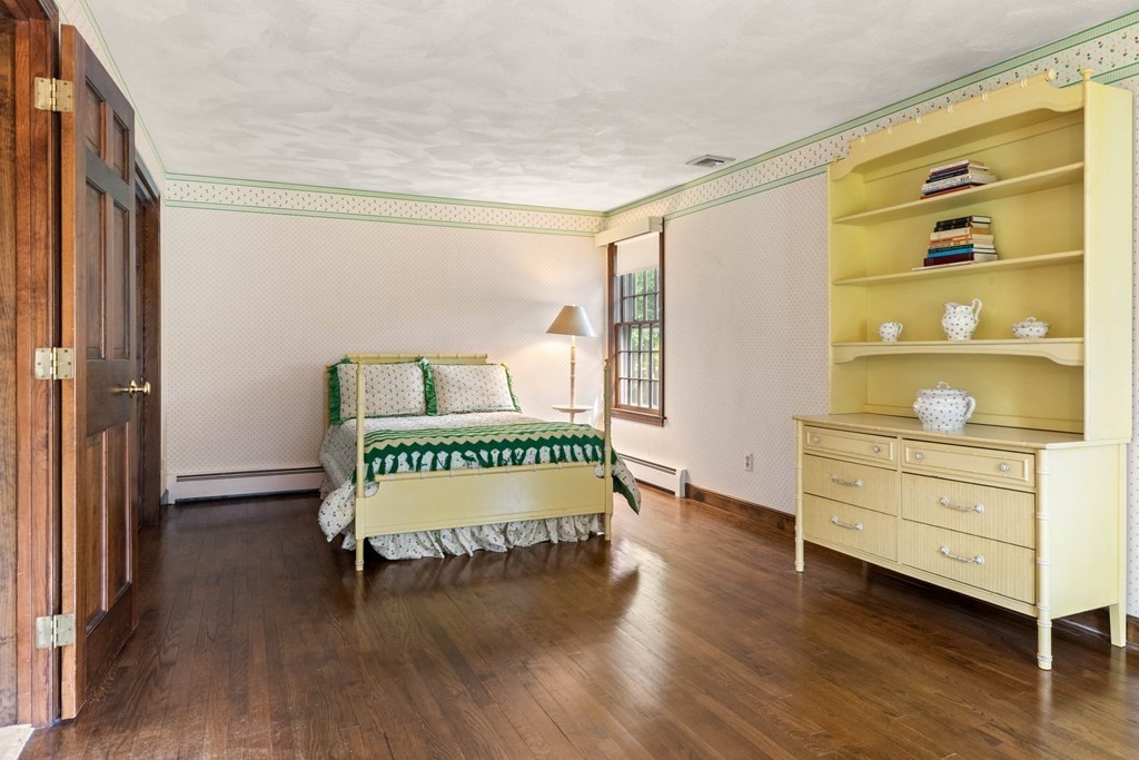 153 Hay Meadow Road North Andover, MA 01845 - Photo 33 of 42 a bedroom with a bed and a dresser