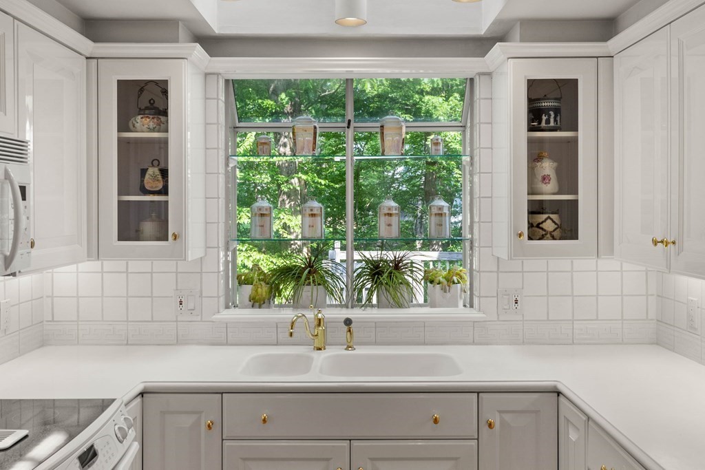 153 Hay Meadow Road North Andover, MA 01845 - Photo 10 of 42 a bathroom with a sink and a window