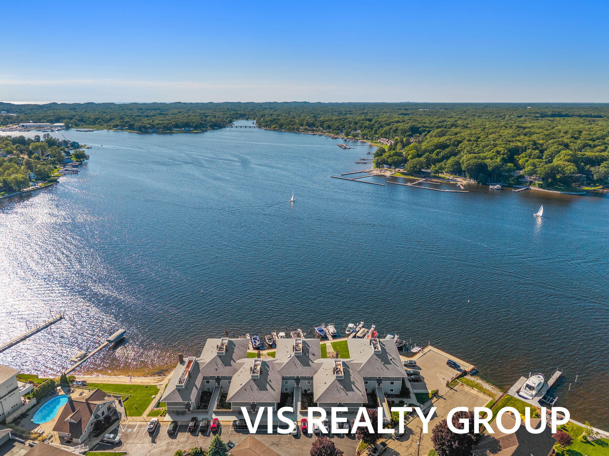 400 Lakeview Court, Unit 8B Spring Lake, MI 49456 - Photo 2 of 64 14-web-or-mls-DJI_20260618181344_0253_D