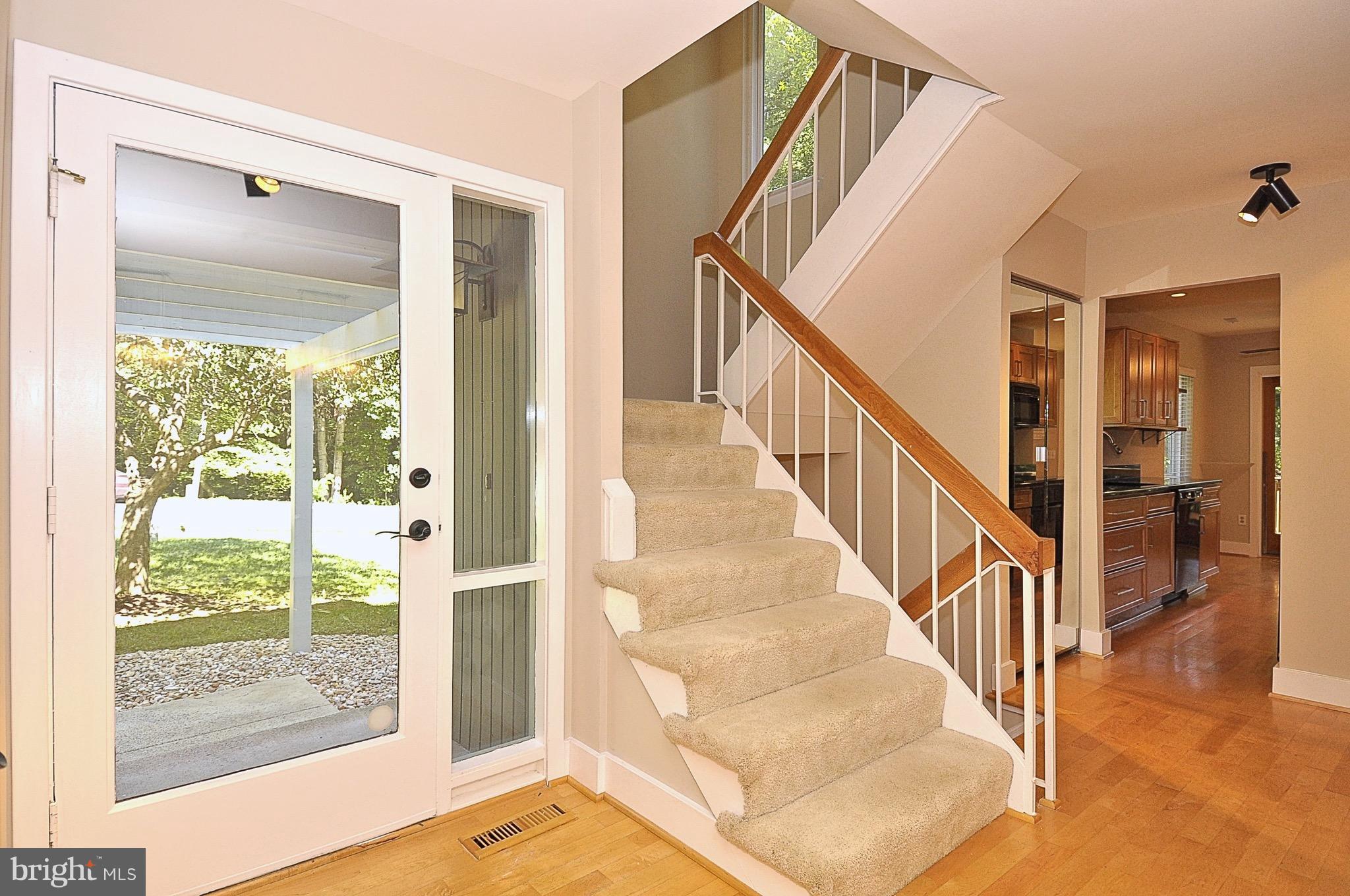 11744 Decade Court Reston, VA 20191 - Photo 15 of 30 large foyer w/ fresh paint and light wood floors