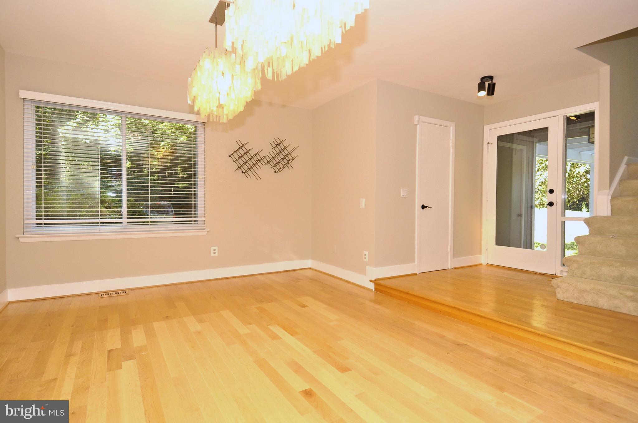 11744 Decade Court Reston, VA 20191 - Photo 16 of 30 step-down large dining area