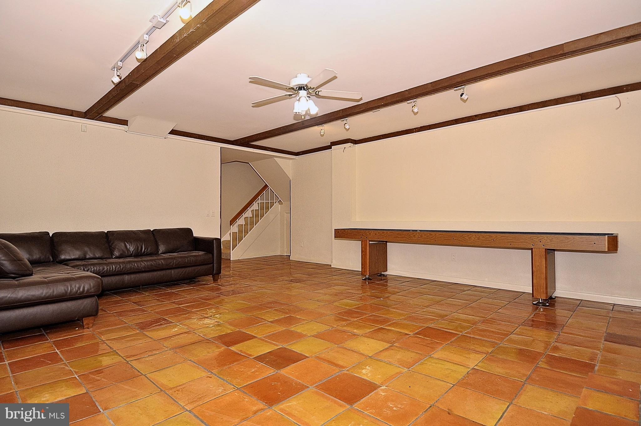 11744 Decade Court Reston, VA 20191 - Photo 18 of 30 huge rec room with mexican tile flooring