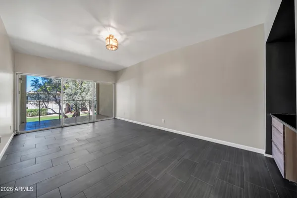 a view of an empty room and window