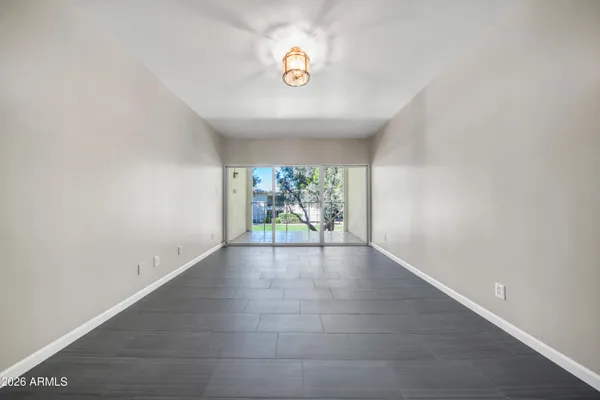 a view of an empty room and window