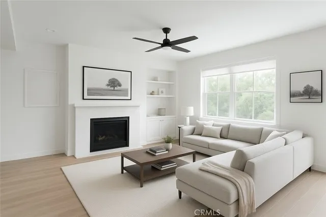 a kitchen with a refrigerator and a stove top oven